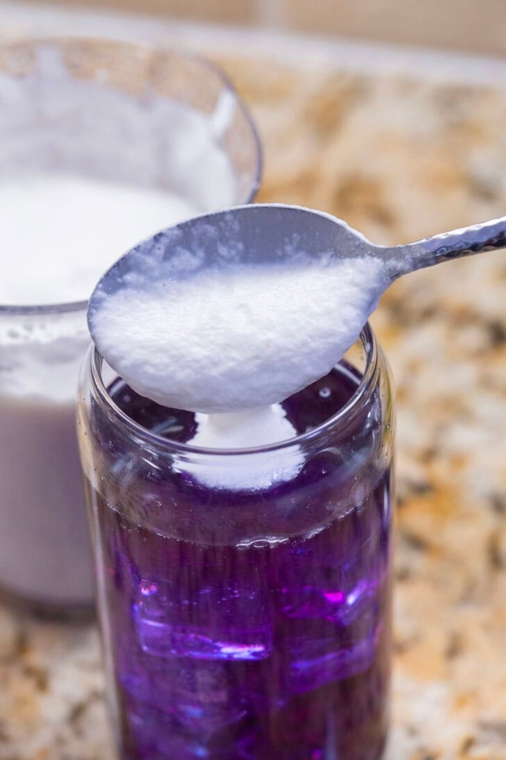 Topping witch's brew dirty soda off with a cap of vanilla sweet cream cold foam.