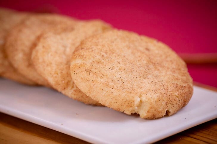 A close-up of a soft eggless snickerdoodle with a crackly cinnamon-sugar top.